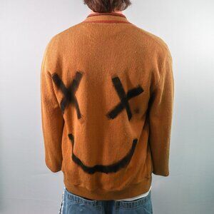 Smirk Stitches Sweater